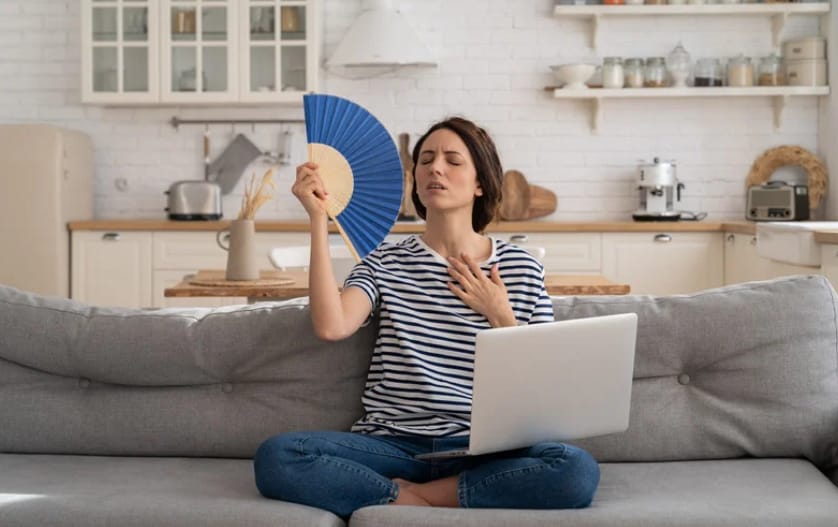 frustrated and hot, wiping their brow